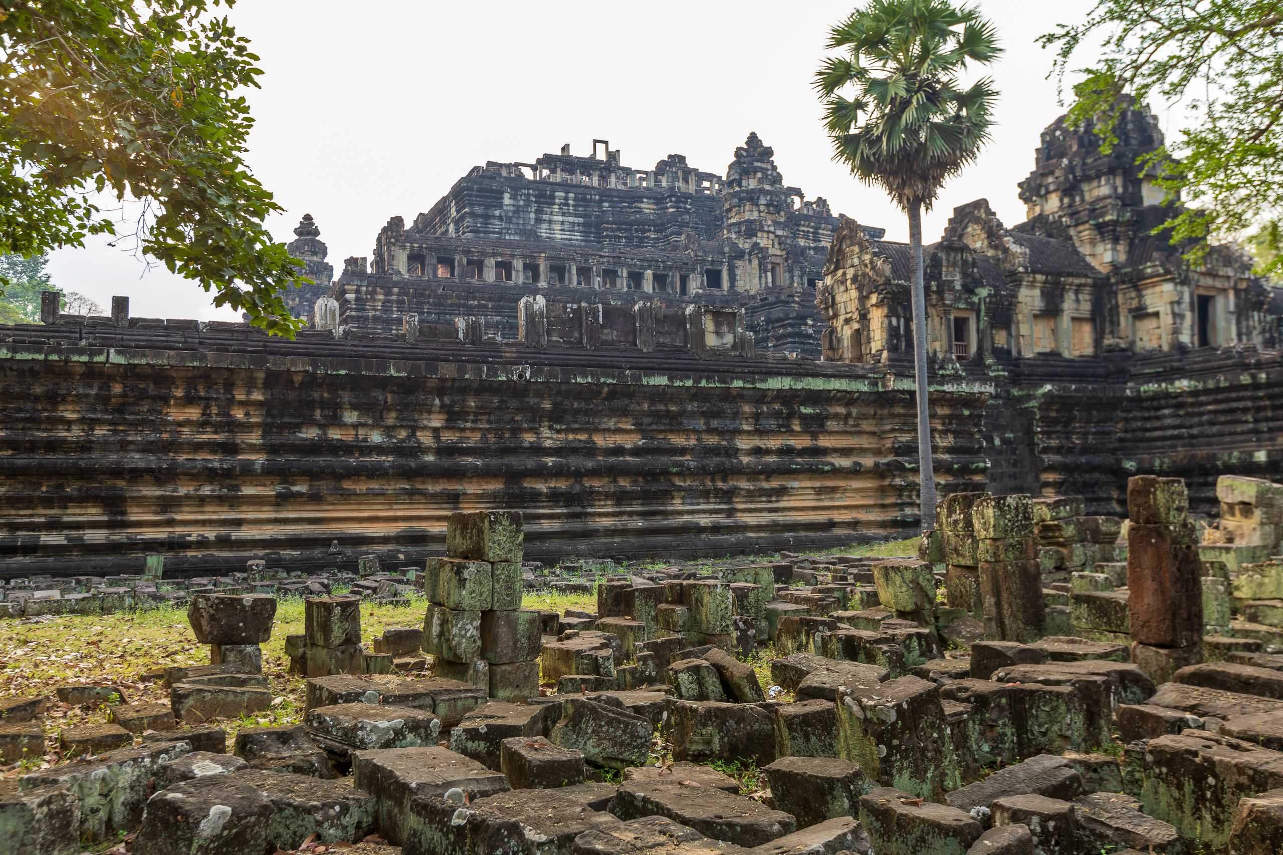 Explore the historical ruins of an ancient Buddhist temple set in lush surroundings.